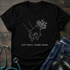 T-Shirt — 'Soft heart, steady hands.' Minimalist Line Art Holding Hands Tee