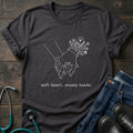 T-Shirt — 'Soft heart, steady hands.' Minimalist Line Art Holding Hands Tee