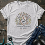 Nurturing the Human Heart RN Mom Floral Tee