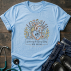 Nurturing the Human Heart RN Mom Floral Tee