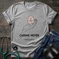 Caring Never Stops Nurse Humor Graphic Tee - Sport Grey / XS | YOUSTOMIZE