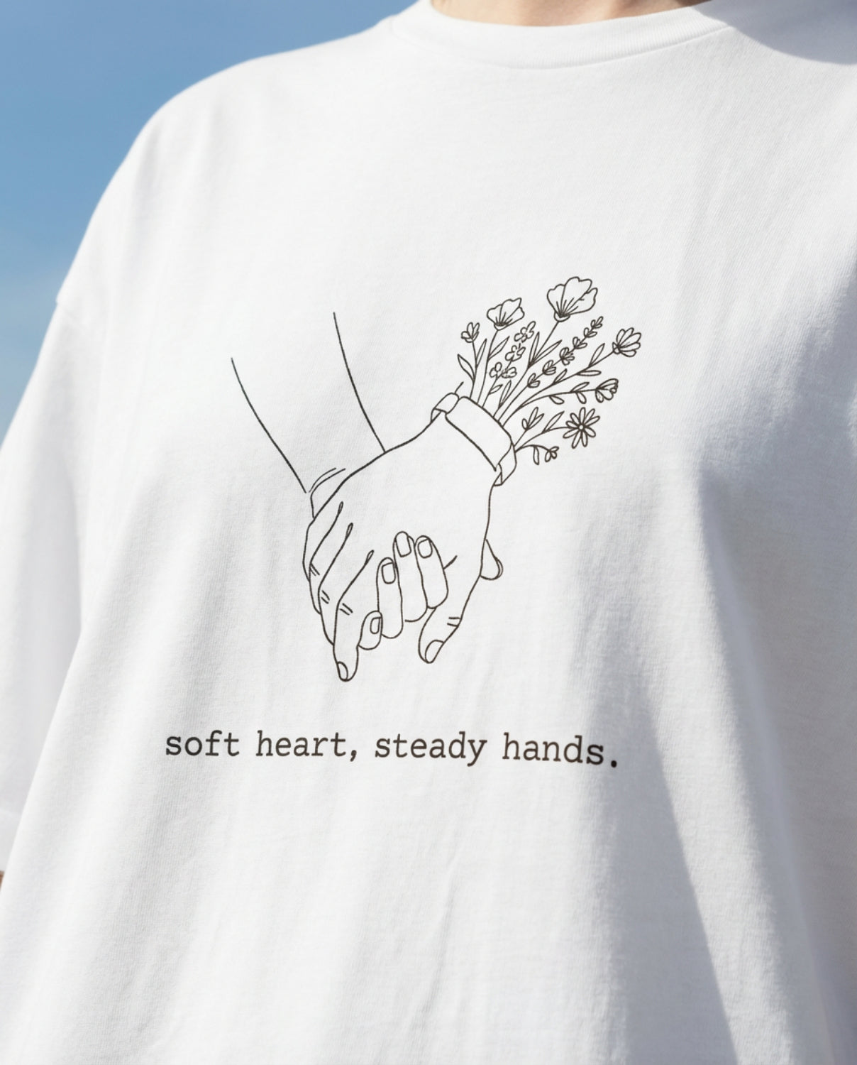 Soft Heart, Steady Hands T-Shirt — Minimalist Hand-Holding Nurse Design-Black / XS-YOUSTOMIZE