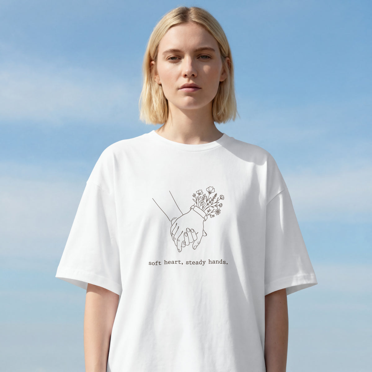 Soft Heart, Steady Hands T-Shirt — Minimalist Hand-Holding Nurse Design-Black / XS-YOUSTOMIZE